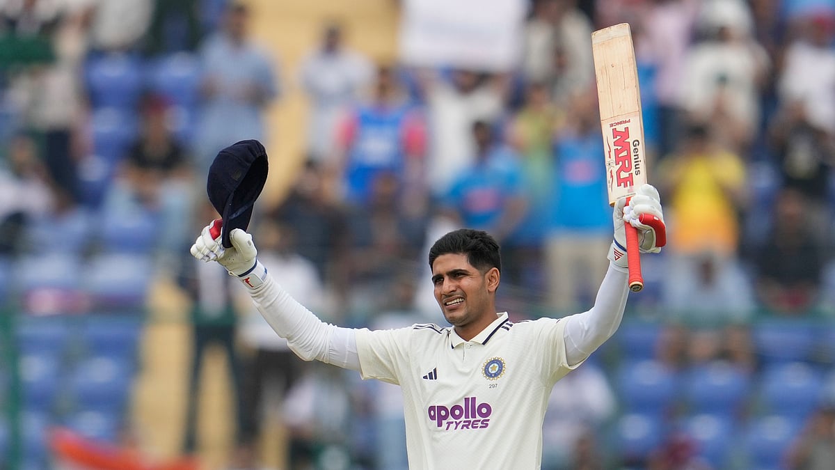 India's captain Shubman Gill celebrates after scoring a century on the second day of the second cricket test match between India and West Indies at the Arun Jaitley Stadium in New Delhi, India, Saturday, Oct.11, 2025. - (AP Photo/Manish Swarup)