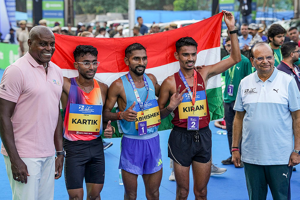 Delhi Half Marathon 2025 photos_Carl Lewis, Abhishek Pal, Kiran Matre