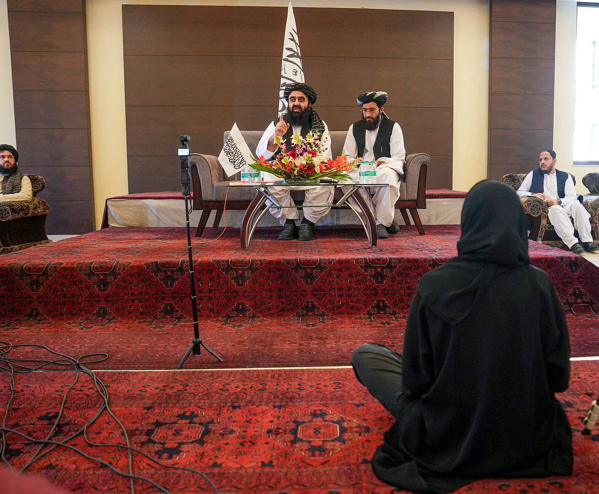PTI :  Afghanistan Foreign Minister Amir Khan Muttaqi, left, addresses a press conference, in New Delhi, Sunday, Oct. 12, 2025.
