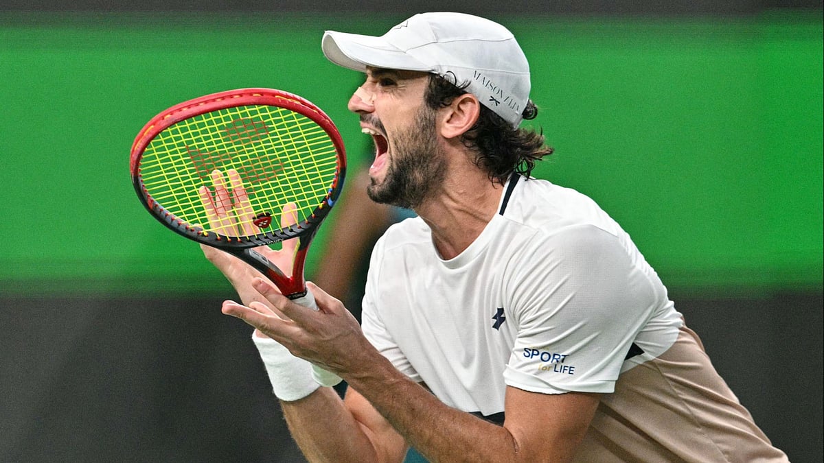Valentin Vacherot celebrates his win in Shanghai Masters 2025 against Arthur Rinderknech.
