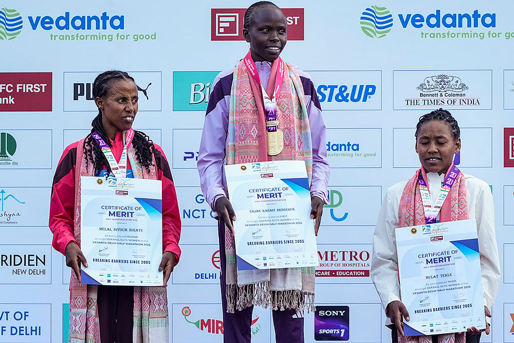 Delhi Half Marathon 2025 photos_Lilian Kasait Rengeruk, Melal Siyoum Biratu, Mulat Tekle