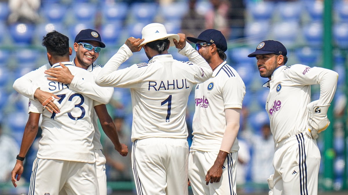 Photo: PTI | Shahbaz Khan : India vs West Indies Highlights, 2nd Test Day 4: IND celebrate a WI wicket in Delhi.