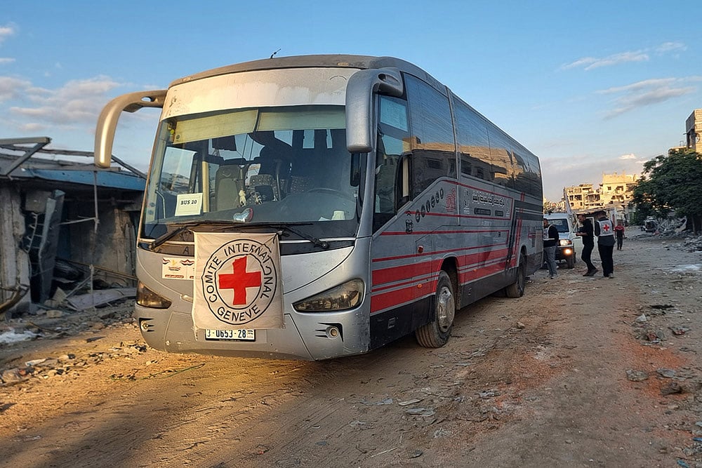 Israel Hamas Gaza war- Hostage release _Red Cross vehicle in Khan Younis