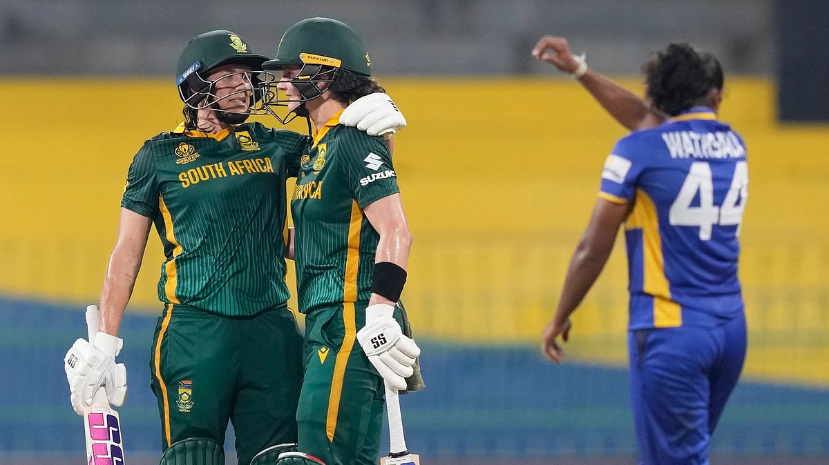 Tazmin Brits and Laura Wolvaardt celebrating after beating Sri Lanka Women by 10 wickets