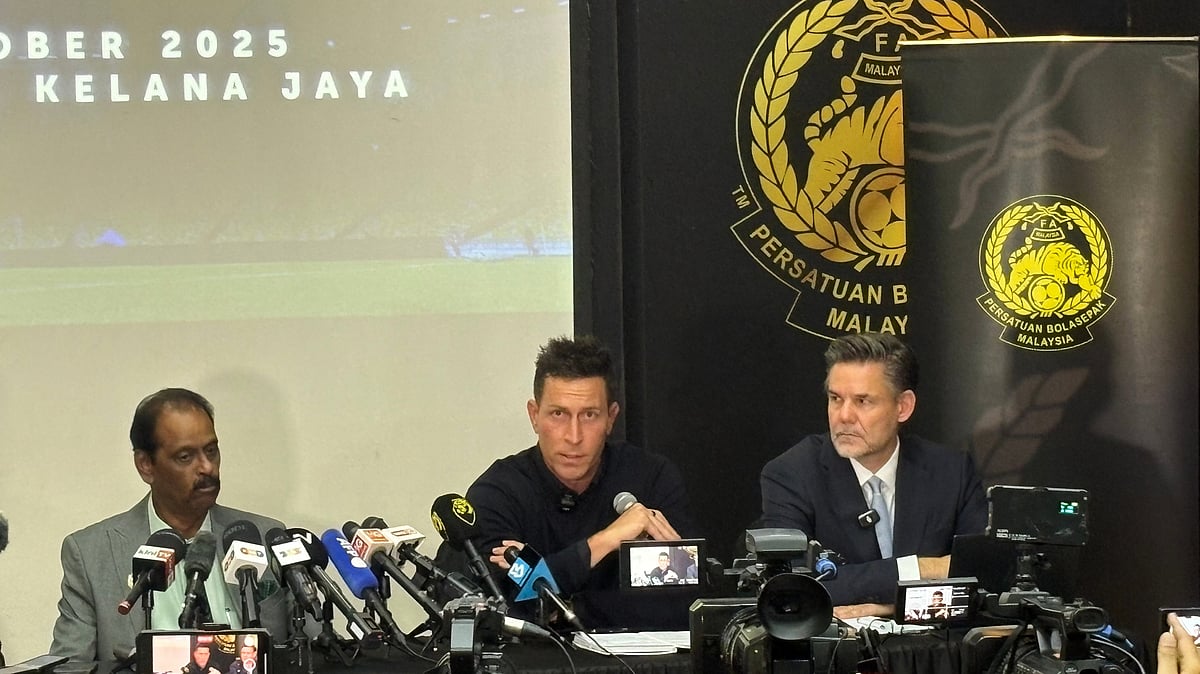 |Photo: AP/Eileen Ng : From left, Football Association of Malaysia (FAM) Vice President Sivasundaram Sithamparam Pillai, Malaysia national squad CEO Robert Douglas Friend and FAM legal counsel Serge Vittoz attend a press conference in Petaling Jaya, suburb of Kuala Lumpur, Malaysia Friday, Oct 17, 2025.