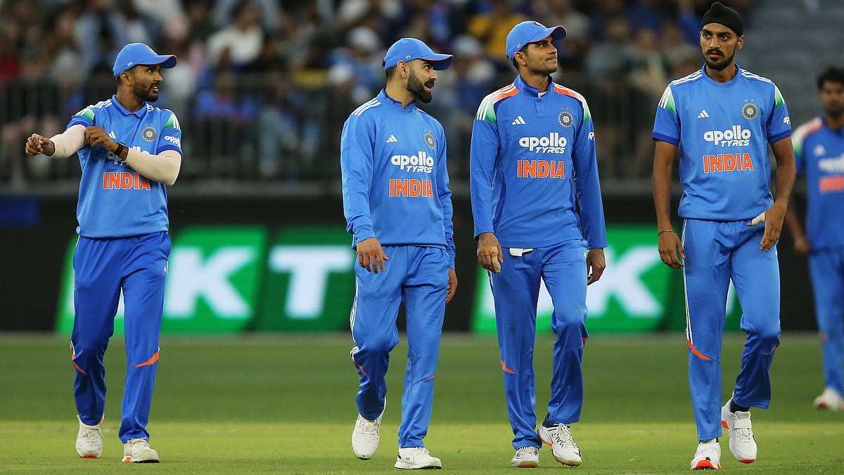 | Photo: AAPImage/David Woodley via AP : Indian players make their way to the drinks station during the one day international cricket match between Australia and India in Perth Australia, Sunday, Oct. 19, 2025. 