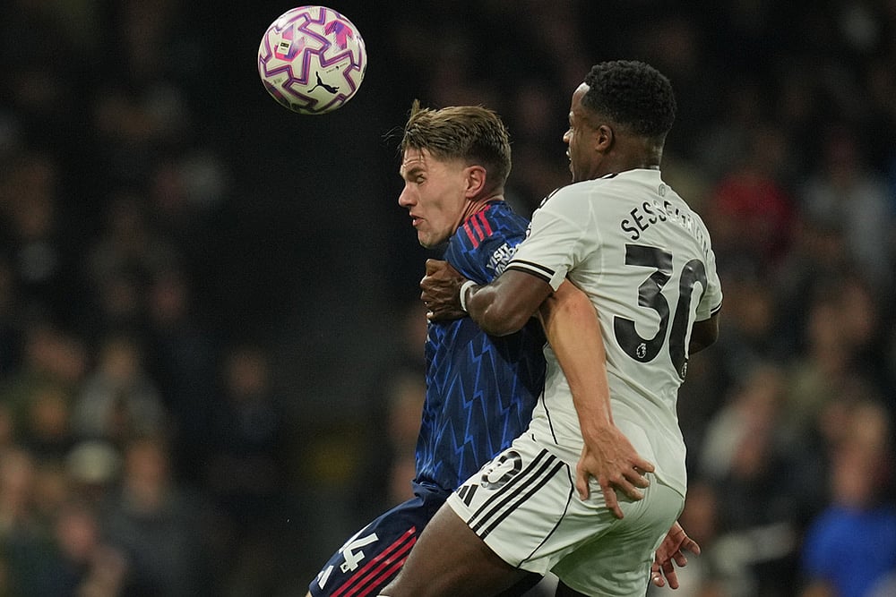 Britain soccer Premier League Arsenal Vs Fulham match photos_ Ryan Sessegnon