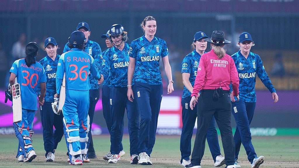 AP : India's players shake hands with England's players after the ICC Women's Cricket World Cup match in Indore.