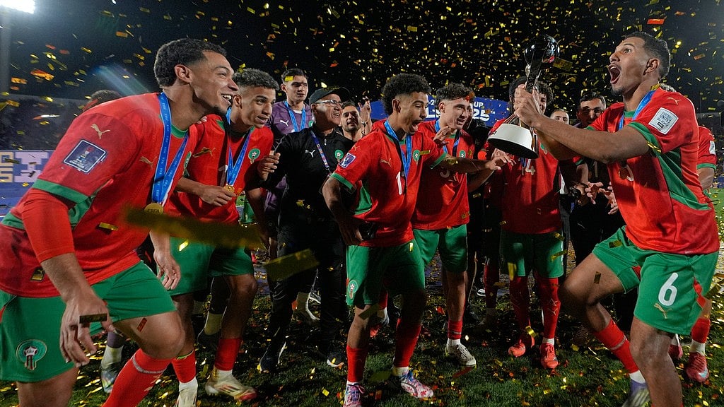 AP : Morocco's Naim Byar and teammates celebrate after winning the FIFA U-20 World Cup final against Argentina in Santiago, Chile.