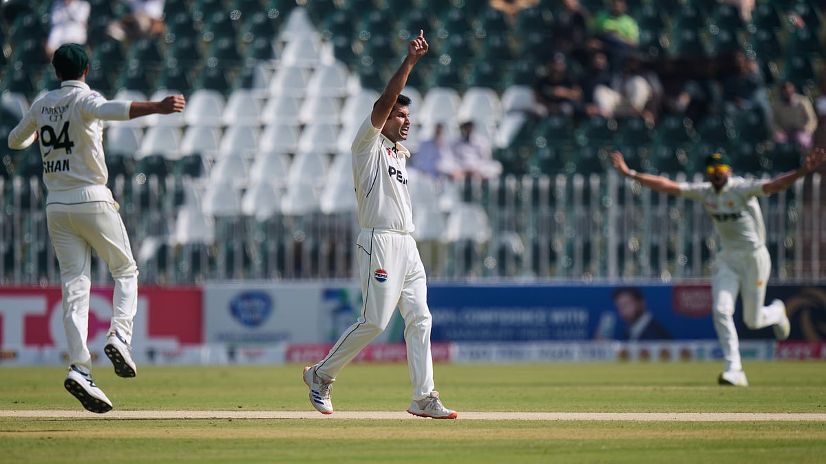 | Photo: AP/Anjum Naveed : Pakistan's Asif Afridi and teammates celebrate after the dismissal of South Africa's Tristan Stubbs during the third day of the second Test matchin Rawalpindi on Wednesday, October 22, 2025.