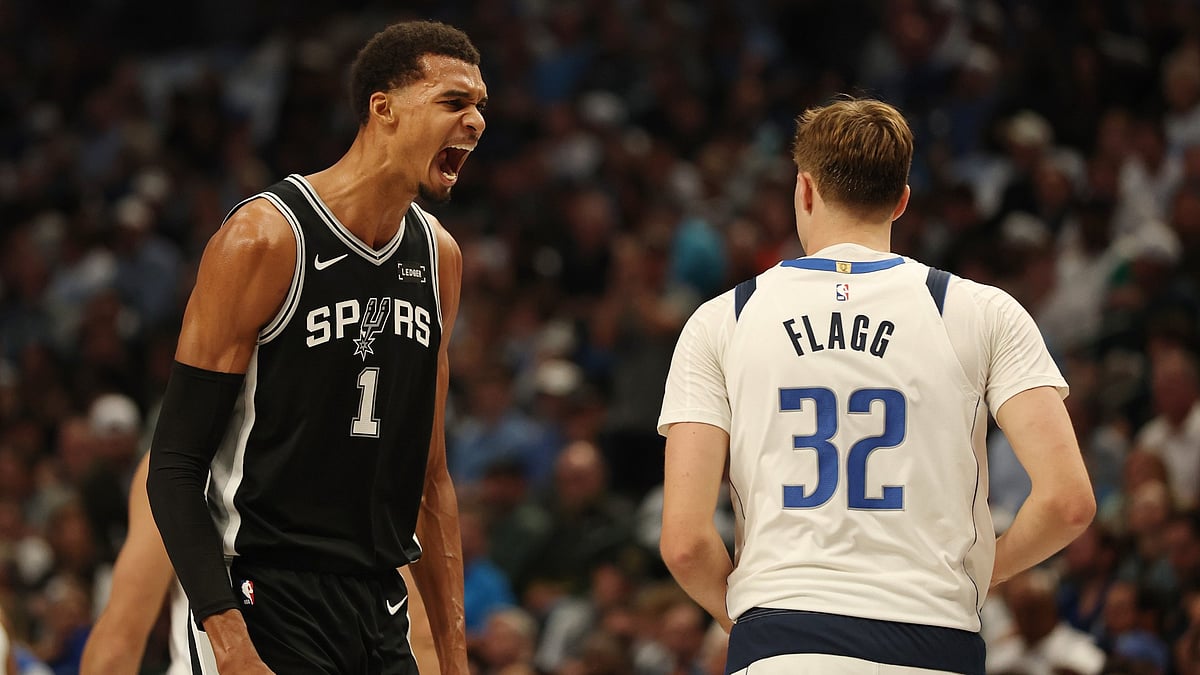 Victor Wembanyama #1 of the San Antonio Spurs reacts to a score during the first half against the Dallas Mavericks at American Airlines Center on October 22, 2025 in Dallas, Texas.