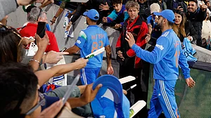 | Photo: AP/James Elsby : India's Virat Kohli, right, waves to supporters as he leaves the field following the one day international cricket match between Australia and India in Adelaide, Australia, Thursday, Oct. 23, 2025.