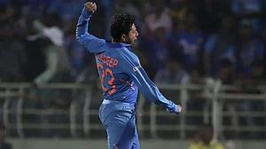 File Photo : Kuldeep Yadav celebrates after taking a wicket in an ODI match
