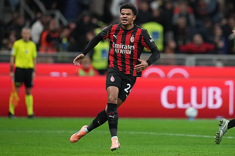AC Milan's Zachary Athekame celebrates after scoring during the Serie A soccer match between AC Milan and Pisa in Milan, Italy.