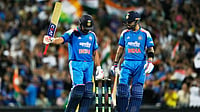 ‘Hopefully, Not This Time’: Mitchell Santner’s Message For Virat Kohli And Rohit Sharma Before IND Vs NZ ODI Series Photo: AP : India Vs Australia Highlights, 3rd ODI: Rohit Sharma, left, raises his bat after making 100 runs against Australia as teammate Virat Kohli watches on in Sydney.