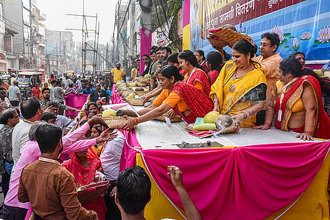 Volunteers distribute Chhath Puja essentials on the occasion of ‘Nahay Khay’, the first day of the four-day Chhath festival, in Patna.