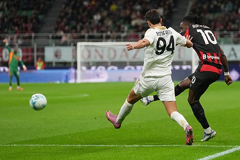 AC Milan's Rafael Leao scores during the Serie A soccer match between AC Milan and Pisa in Milan, Italy.