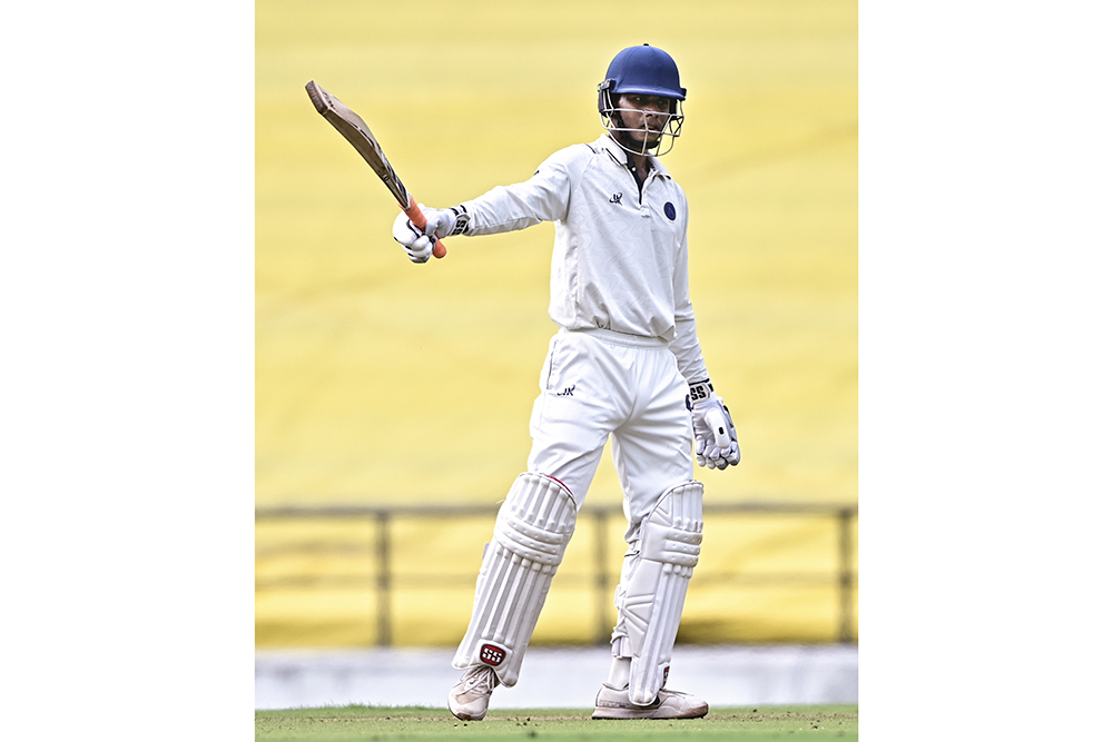 Jharkhand’s Shikhar Mohan celebrates his half century on day one of a Ranji Trophy cricket match between Vidarbha and Jharkhand, at VCA Stadium, in Nagpur.