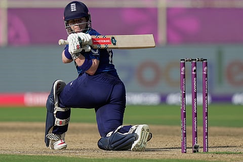 England's Tammy Beaumont plays a shot during the ICC Women's Cricket World Cup match between England and New Zealand at ACA–VDCA Cricket Stadium in Visakhapatnam.