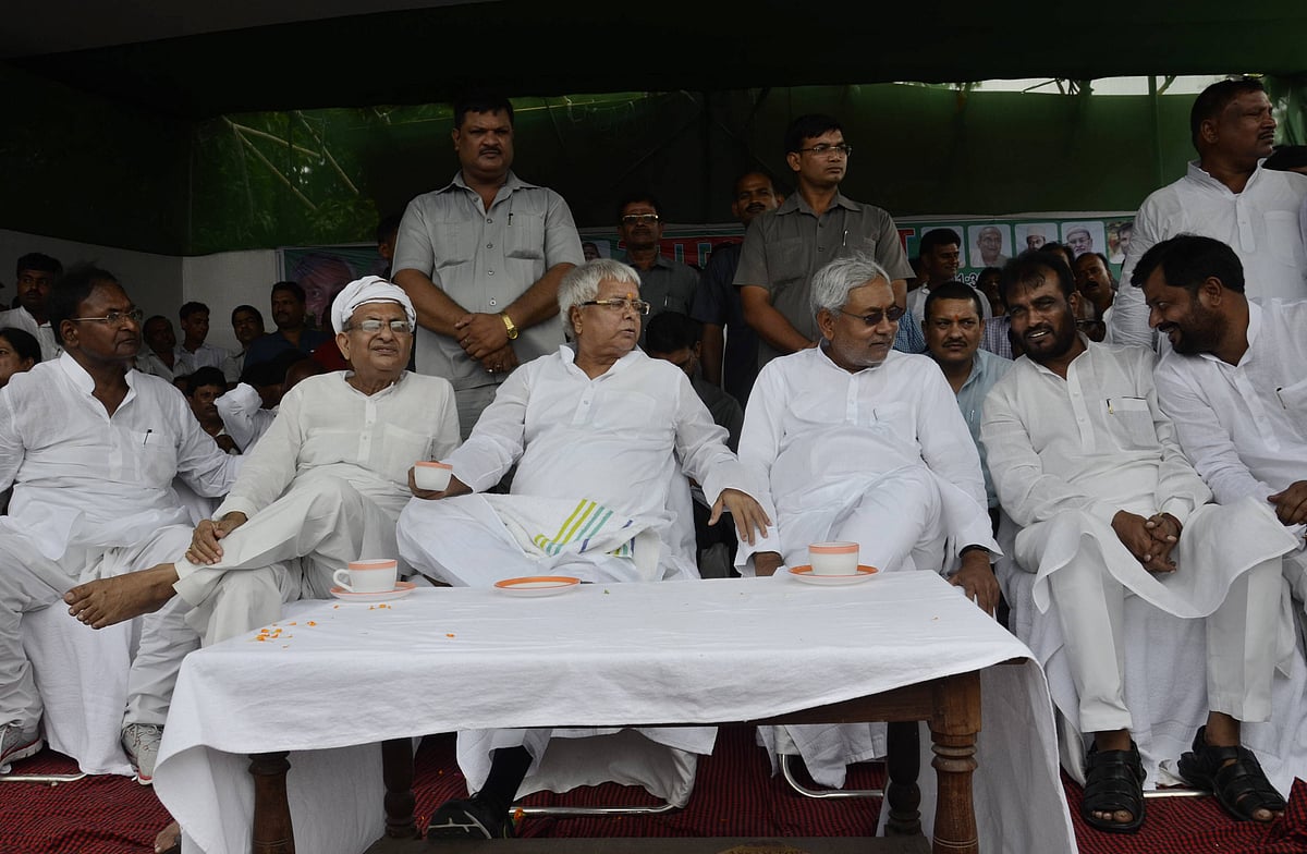  Santosh Kumar Hindustan Times : RJD chief Lalu Prasad and JD (U) senior leader Nitish Kumar at a by-election rally at on August 11, 2014 in Hajipur, India. This was first time after two decades that the two leaders shared a dias. The joint rally of Lalu and Nitish kicked off the byelection campaign of secular alliance of RJD, JD(U) and Congress for 10 assembly seats of Bihar that would go to vote on August 21. Lalu Prasad Yadav and Nitish Kumar Share Dais After Two Decades

