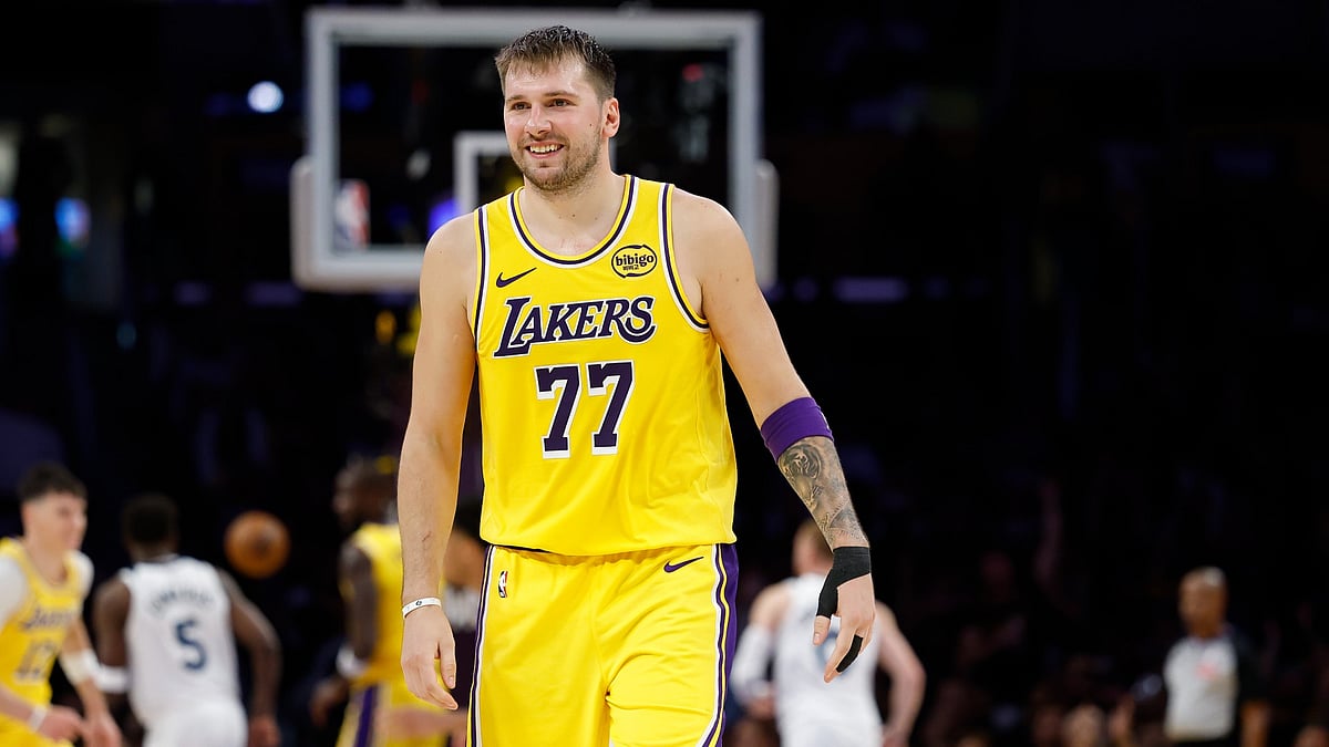 Luka Doncic #77 of the Los Angeles Lakers reacts during play against the Minnesota Timberwolves in the second half at Crypto.com Arena on October 24, 2025 in Los Angeles, California.