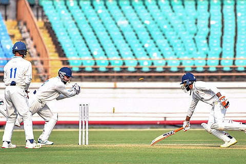 Saurashtra’s Ravindra Jadeja being stumped by Madhya Pradesh’s wicketkeeper Himanshu Mantri on day one of a Ranji Trophy cricket match between Saurashtra and Madhya Pradesh, at Niranjan Shah Stadium, in Rajkot.