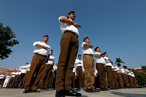Members of the Rashtriya Swayamsevak Sangh (RSS) take part in an event marking Accession Day celebrations, in Jammu.