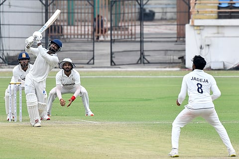 Madhya Pradesh's Himanshu Mantri plays a shot on day two of a Ranji Trophy cricket match between Saurashtra and Madhya Pradesh, at Niranjan Shah Stadium, in Rajkot.