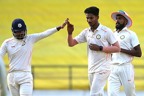 Vidarbha's Nachiket Bhute celebrates with teammates after taking the wicket of Jharkhand’s Vikas Kumar on day two of a Ranji Trophy cricket match between Vidarbha and Jharkhand, at VCA Stadium, in Nagpur.