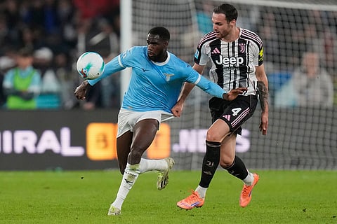Juventus' Federico Gatti pulls Lazio's Boulaye Dia during the Italian Serie A soccer match between Lazio and Juventus in Rome.