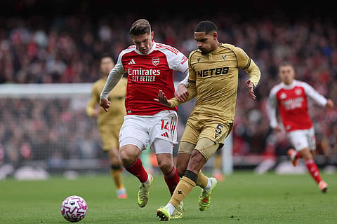 Arsenal's Viktor Gyoekeres, left, challenges for the ball with Crystal Palace's Maxence Lacroix during the English Premier League soccer match between Arsenal and Crystal Palace in London.