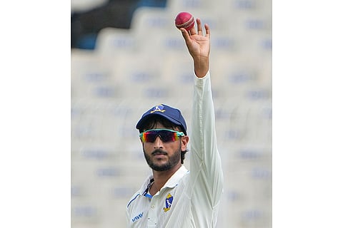 Bengal's Shahbaz Ahmed celebrates on Day 3 of the Ranji Trophy cricket match between Bengal and Gujarat, at Eden Gardens, in Kolkata.
