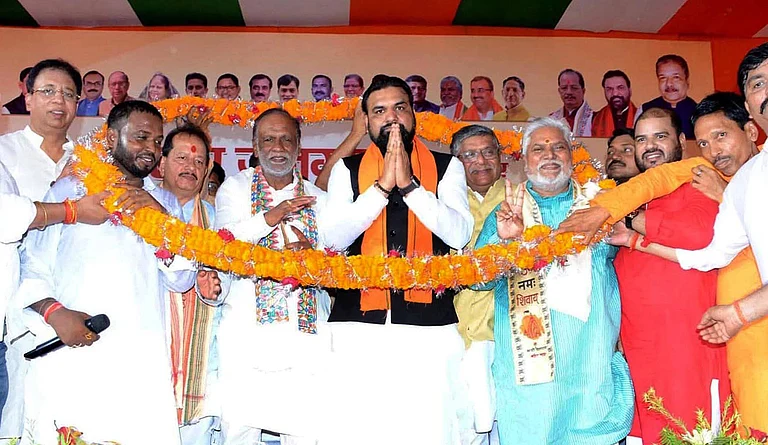 Bihar Deputy Chief Minister Samrat Choudhary with BJP OBC Morcha national president K. Laxman-MP and others being garlanded during thanksgiving programme of Prime Minister Narendra Modi for Caste Census at BJP office on July 5, 2025 in Patna, India. - Photo by Santosh Kumar Hindustan Times
