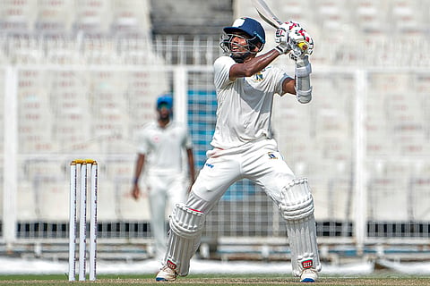 Bengal's Abhimanyu Easwaran plays a shot during day three of the Ranji Trophy cricket match against Gujarat at Eden Gardens, in Kolkata.