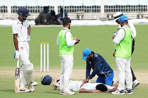 Gujarat's Urvil Patel takes massage during a break on the fourth day of the Ranji Trophy 2025-26 cricket match between Bengal and Gujarat, at Eden Gardens, in Kolkata.