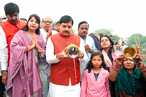 Madhya Pradesh Chief Minister Mohan Yadav performs rituals during Chhath Puja festivities in Ujjain, Madhya Pradesh.