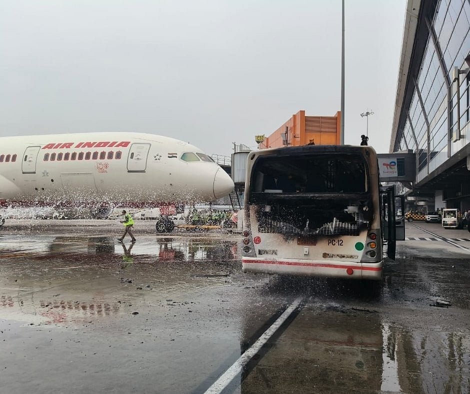 The bus, used to transport passengers within the airport premises, sustained damage in the incident.  - PTI