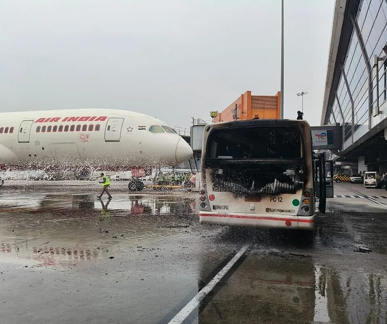 The bus, used to transport passengers within the airport premises, sustained damage in the incident. - PTI
