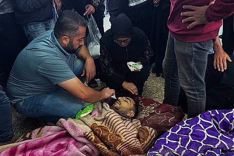 People attend the funeral held at Al-Aqsa Hospital for Palestinians who were killed in the Israeli attack on Dair El-Balah People attend the funeral held at Al-Aqsa Hospital for Palestinians who were killed in the Israeli attack on Dair El-Balah, despite the ceasefire in Gaza on October 29, 2025. At least 91 people were killed in the attack, including children. 