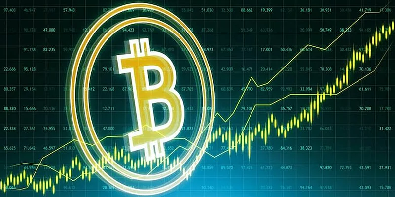 Bitcoin symbol with chart in background