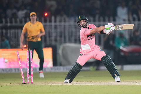 Pakistan's Sahibzada Farhan is bowled out by South Africa's Lizaad Williams during the first T20 cricket match between Pakistan and South Africa, in Rawalpindi, Pakistan.