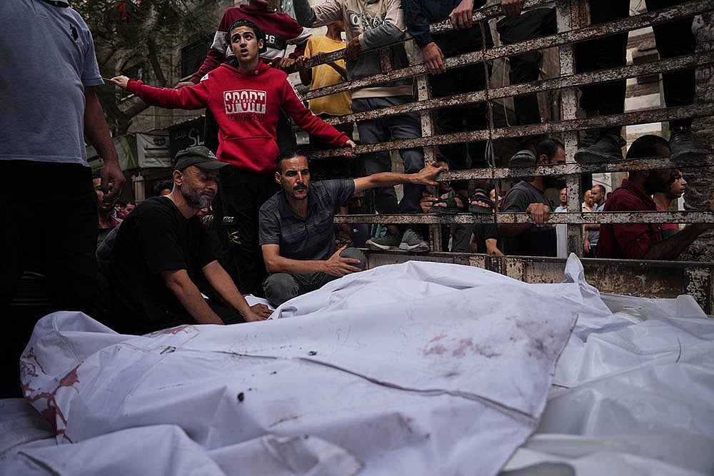 Gaza war, Israeli army strike on the Bureij camp_funeral at Al-Awda Hospital in Nuseirat