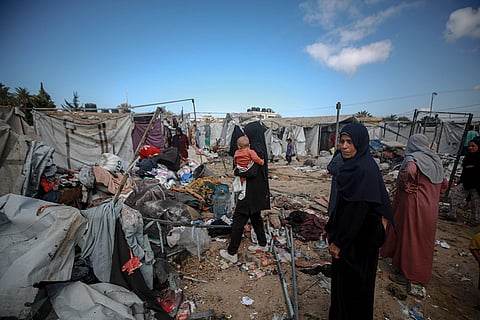 Displaced Palestinians inspect the damage after an Israeli army strike on their tent camp in Deir al-Balah, Gaza Strip Displaced Palestinians inspect the damage after an Israeli army strike on their tent camp in Deir al-Balah, Gaza Strip, Wednesday, Oct. 29, 2025.