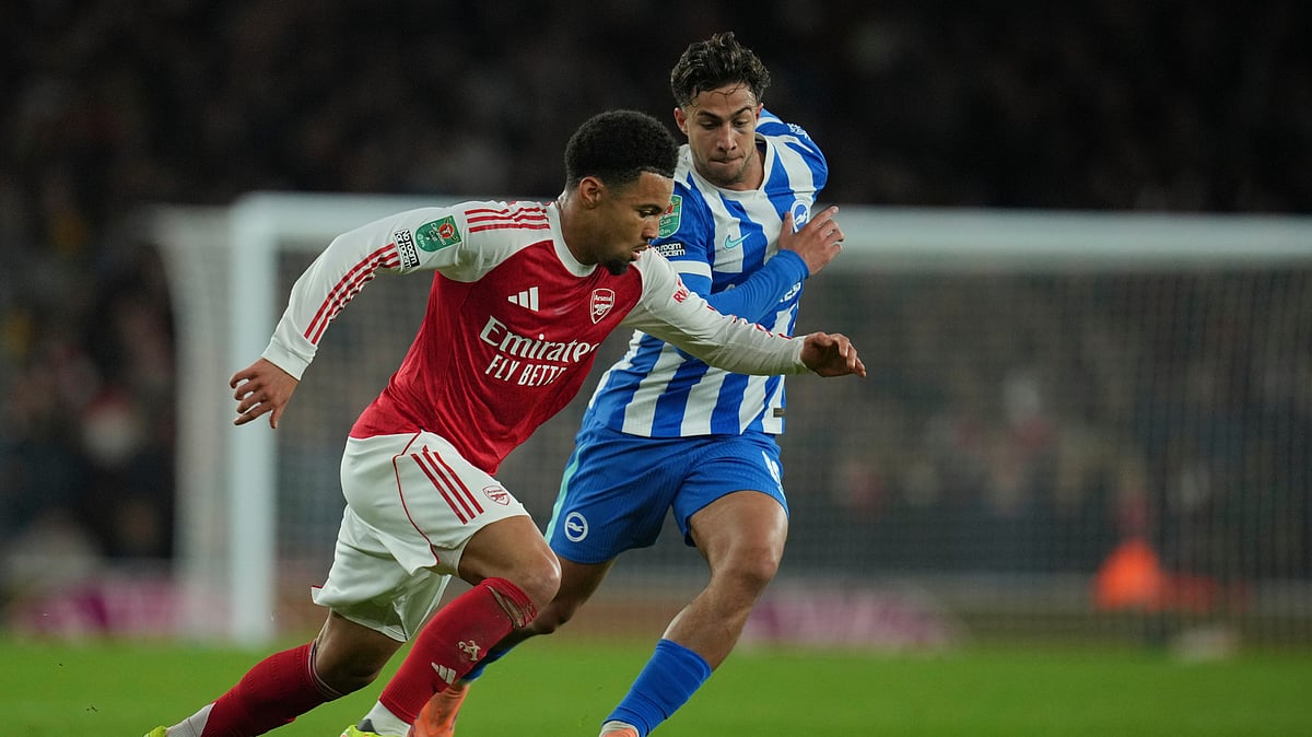 AP : Ethan Nwaneri, left, is challenged by Brighton's Charalampos Kostoulas during the English League Cup soccer match
