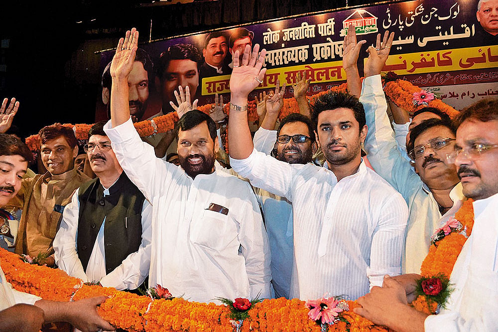 | Photo: PTI : Father-son Duo: Ram Vilas Paswan (left) and Chirag Paswan (right) in Patna
