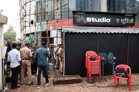 Police personnel at the site where 19 persons including 17 children were rescued from a studio in Powai area while the man who had held them hostage succumbed to bullet injuries sustained during the operation, in Mumbai.