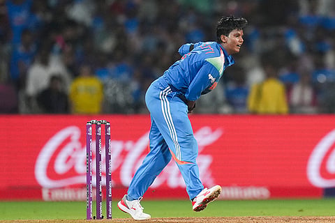 India's Deepti Sharma bowls a delivery during an ICC Women's World Cup semifinal ODI cricket match between India Women and Australia Women, at the DY Patil Stadium, in Navi Mumbai.