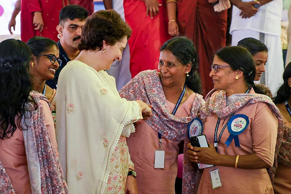 | Photo: AICC via PTI : Priyanka Gandhi Vadra in Wayanad: Congress MP Priyanka Gandhi Vadra during the inauguration of the Kudumbasree annual celebration at Mini Stadium, Padinjarathara, in Wayanad, Kerala. 