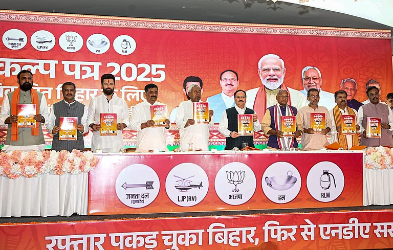 Patna: BJP National President JP Nadda with Bihar Chief Minister Nitish Kumar, BJP's Bihar election in-charge Dharmendra Pradhan, LJP (Ram Vilas) chief Chirag Paswan, Hindustani Awam Morcha (Secular) leader Jitan Ram Manjhi, Deputy CM Samrat Choudhary, JDU National Working President Sanjay Jha and others releases the National Democratic Alliance's (NDA) manifesto for the upcoming state Assembly elections, in Patna, Friday, Oct. 31, 2025. - PTI