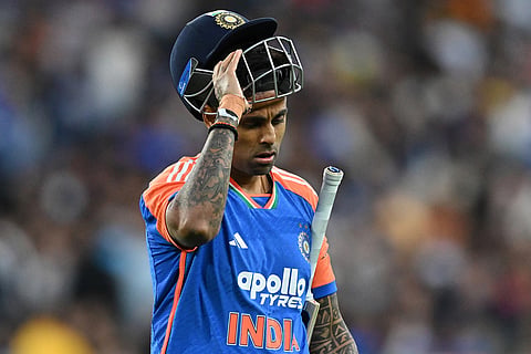 India's Suryakumar Ashok Yadav walks off after losing his wicket to Australia during their T20 cricket match in Melbourne, Australia.